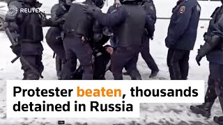 Police beat protester, 4,300 detained at protest in Russia