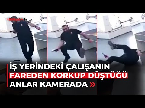 İş yerinde fareden korkan çalışanın yere düşme anı kamerada