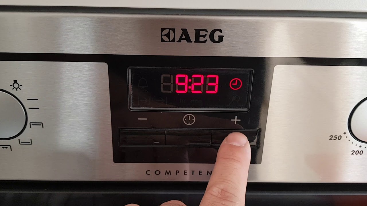 How change clock/time on AEG oven - YouTube