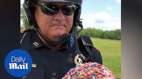 Hilarious cop accepts doughnut as bribe!