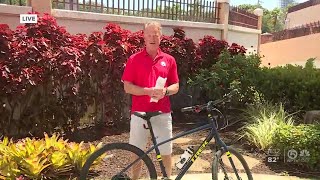 Steve Weagle thanks Brenda Bailey for $2,000 donation