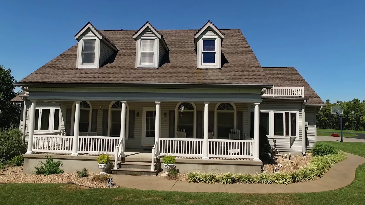 Custom 1.5 story home located on 8 acres with over 5000 sq ft of luxury