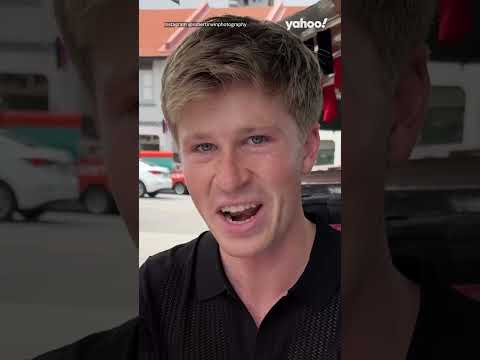 Moment Robert Irwin winces coughs while trying durian for the first time yahooaustralia