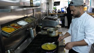 Saag Aloo, Chilli Paneer, Garlic Butter Naan, Soupy Tarka Daal at Punjab Junction Restaurant, London