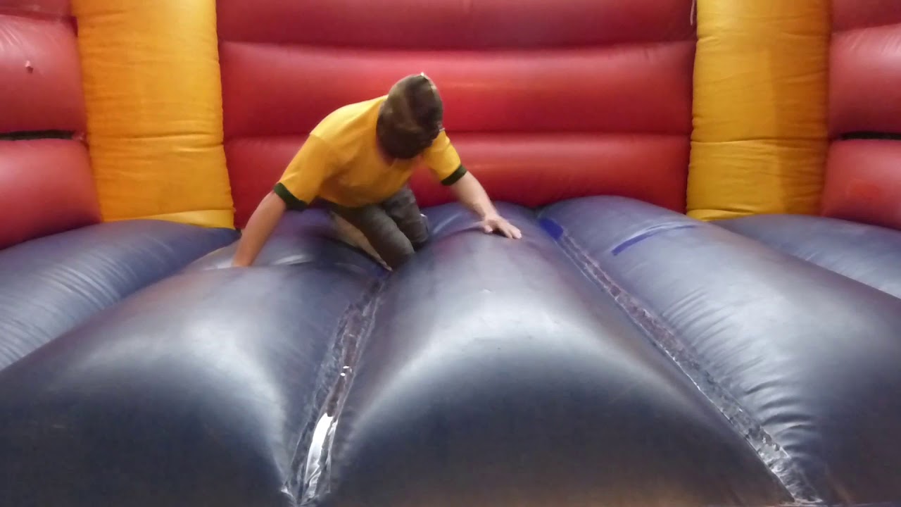 In soccer Shoes on my Bouncy Castle
