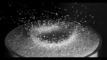 Influence of rotation on the penetration of a projectile into a granular medium