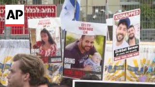 Relatives of hostages held by Hamas protest outside Israel