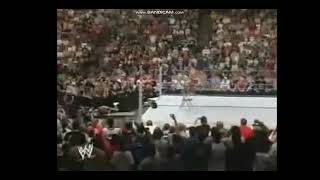 Sabu leg drops Rey Mysterio through table