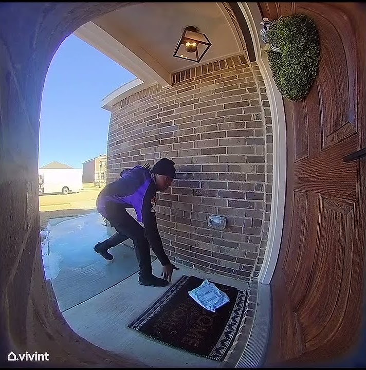 FedEx Delivery Guy Slides Across Ice Delivering Package in Style || ViralHog