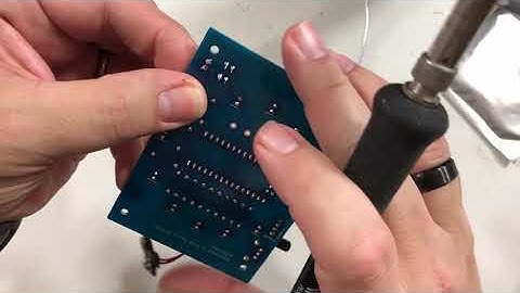 Installing the Battery clip and the Arduino - Electronics and Programming Merit Badge Kit - Spinner