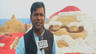 Garden Guinness record holding artist makes 50 ft wide sand Santa face in eastern India Garden Guide