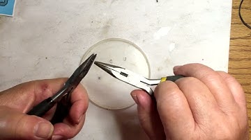 How to turn a jump ring into an oval ring.