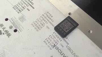 QR code UV laser marking machine on black plastic