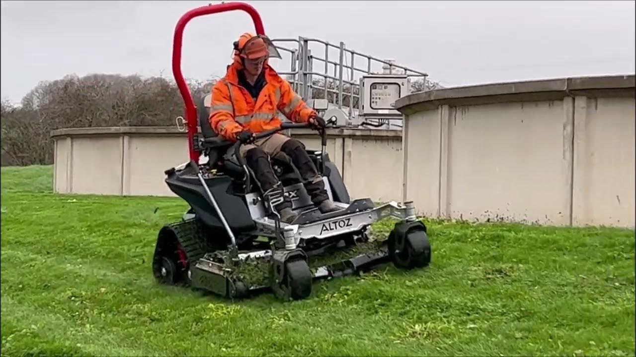 Altoz TRX 354 Tracked Mower Cutting Grass in a Challenging Environment