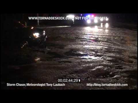 ***NOT FOR BROADCAST*** STORM CHASER TONY LAUBACH www.tornadoeskick.com VIDEO DESCRIPTION A very rare nighttime severe weather event hammers the western suburbs of Denver. At about 1030pm, a tornatic storm with very heavy rains, large hail, very strong winds, and possibly a brief tornado rips through the Wheat Ridge neighborhoods along Kipling Ave between I-70 and Colfax causing extensive tree damage, significant hail damage, and lots of street flooding. This video package covers the storm as it crossed I-70 with the high winds and rain, then covers the time immediately after the storm's passage with the flood waters along and west of Kipling Ave near 44th. This is 1 of 3 videos covering this event and covers the flooding aspects of this storm. Other two packages include nighttime damage immediately after the storm and the early morning and daylight generic damage videos.