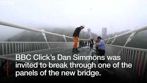 China's giant glass bridge hit with sledgehammer   BBC News