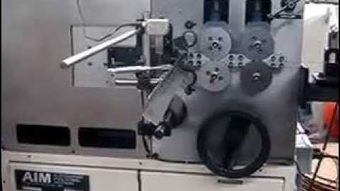 AIM 1000 CNC Coiling Machine forming Closed Coils with laser and payoff