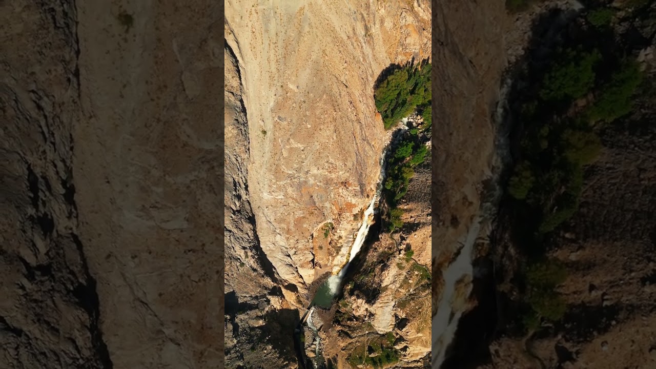 Breathtaking Aerial View of a Majestic Waterfall
