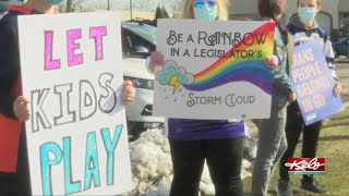 People gather in Sioux Falls for a "Let Kids Play" rally
