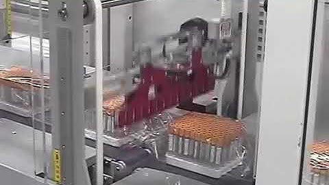 1407ISS wrapping trays of vials