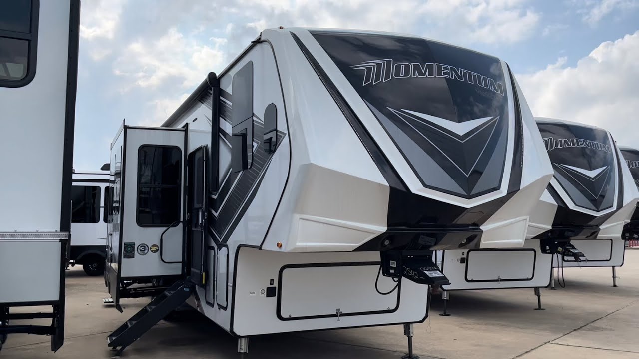 Grand Design Toy Hauler 349M Dual Axle Luxury with storage & Bunks