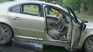 Police find body inside car found in pond