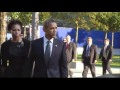 Presidents Obama and Bush arrive at the World Trade Center memorial.