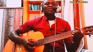 Nnara ekelem key D code combination of DGA played it acoustic guitar