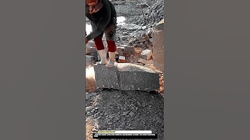 Splitting Granite Stone Worktool with Sledgehammer in Quarry Site