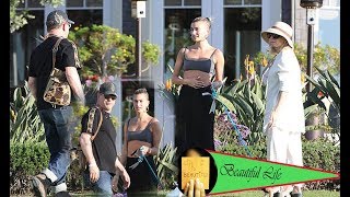 Hailey Baldwin enjoys some bonding time with her dad Stephen and mother Kennya in Los Angeles