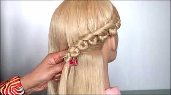 trenza recogida con nuditos de caracolitos
