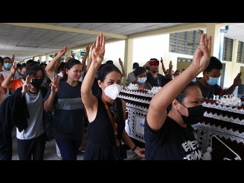 Three finger salutes at Myanmar funerals