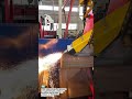 The process takes place inside a large industrial facility