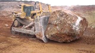 Caterpillar D11R Pushing Another Mive Rock