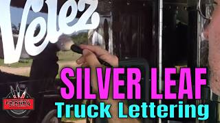 Silver Leaf Lettering, Bright Colors, and Pinstriping Accents on a Kenworth