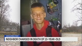 Neighbor charged in death of 13-year-old mauled by dogs