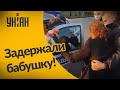 В Беларуси милиционеры затолкали пенсионерку в машину и увезли её в отделение!