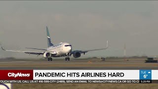 Business report: Pandemic hits airlines hard