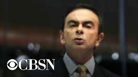 MoneyWatch headlines: Ghosn bail, Uber drivers, big Tesla loss