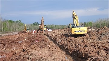 Soil-bentonite slurry trench cutoff wall construction