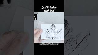 Making leaf prints with black india ink for cards and decor
