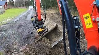 A ditch and a gravel walk.