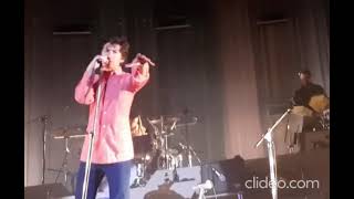 Alex Turner Is Looking At Me And Thrusting Out His Hand