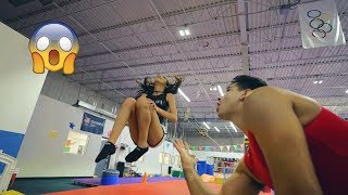 TEACHING MY WIFE HOW TO BACKFLIP (super funny) TEACHING MY WIFE HOW TO BACKFLIP (super funny)