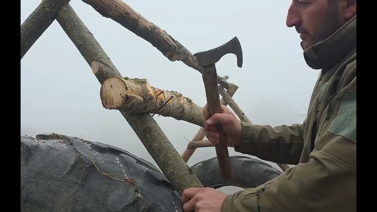 Build a cozy cabin inside a giant tractor tire. 