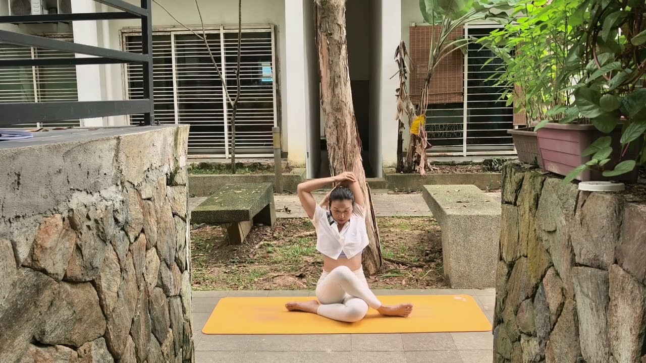 Gomukhasana (Cow's face pose) 