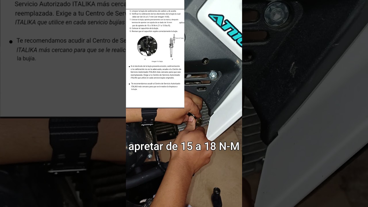 AT 110 LT CAMBIO DE BUJIA Y ACEITE.