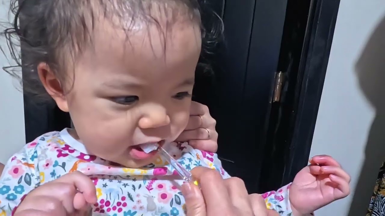 First time brushing Elireh’s teeth.