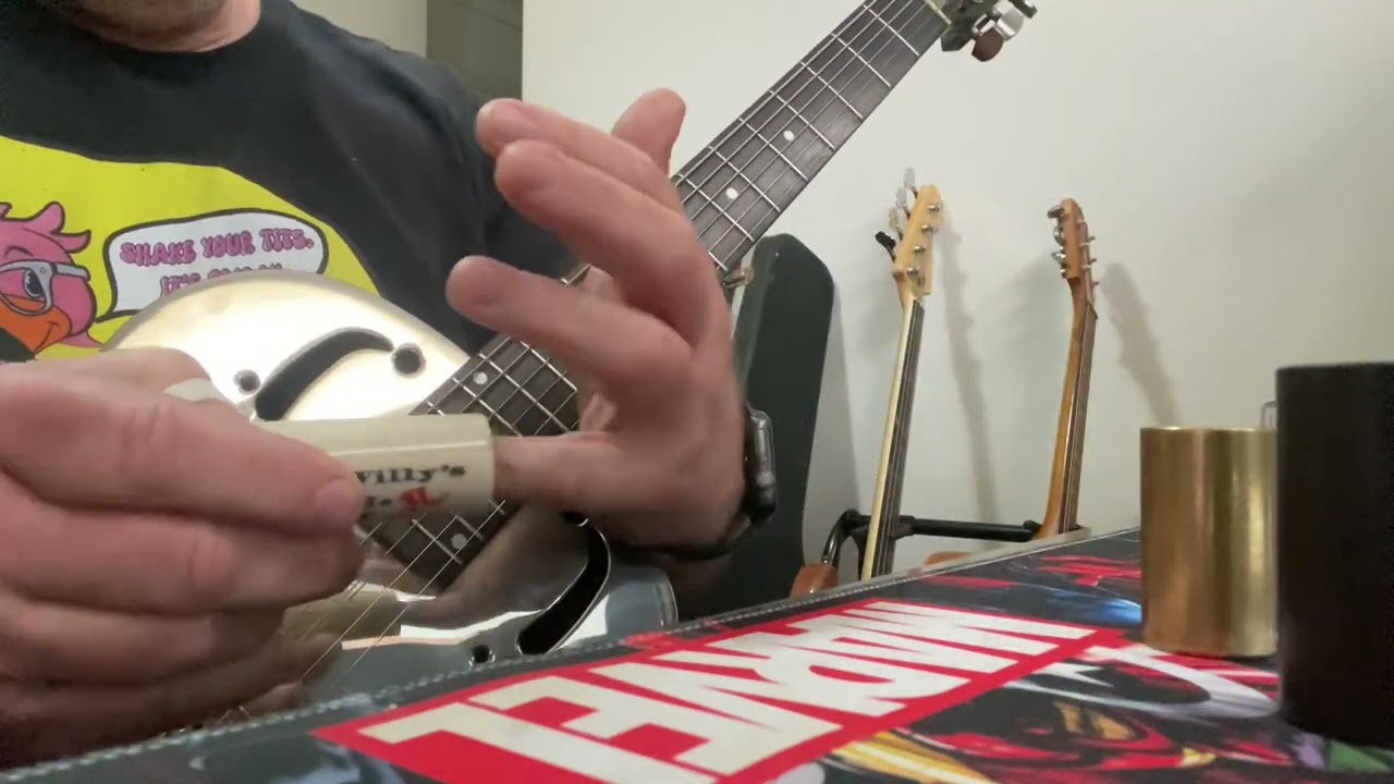 Slide Comparison; Taylor ebony slide, glass slide, porcelain slide, brass slide