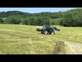 Carrying hay bales with New Holland T4.75 tractor